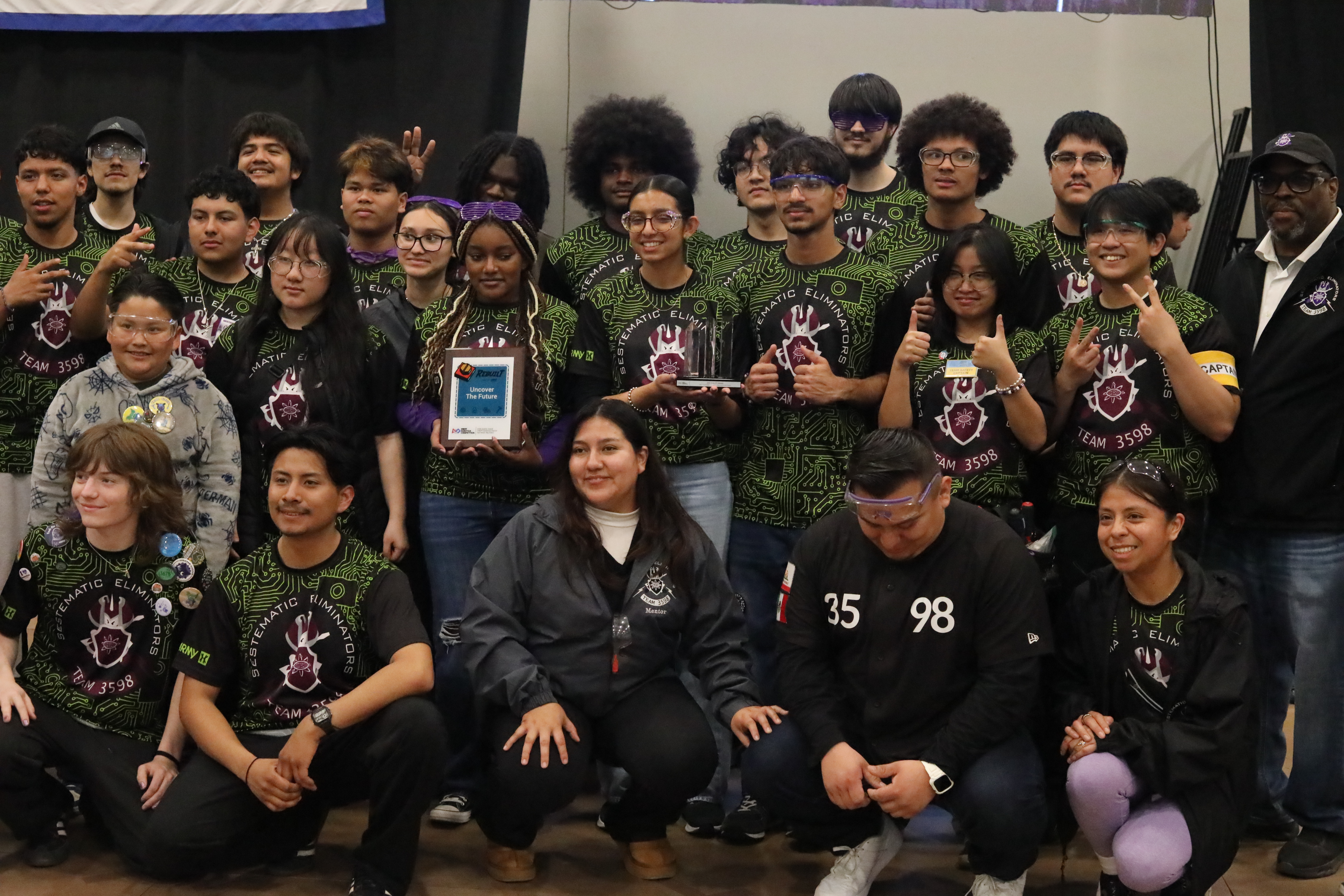 Team 3598 gathered at an event